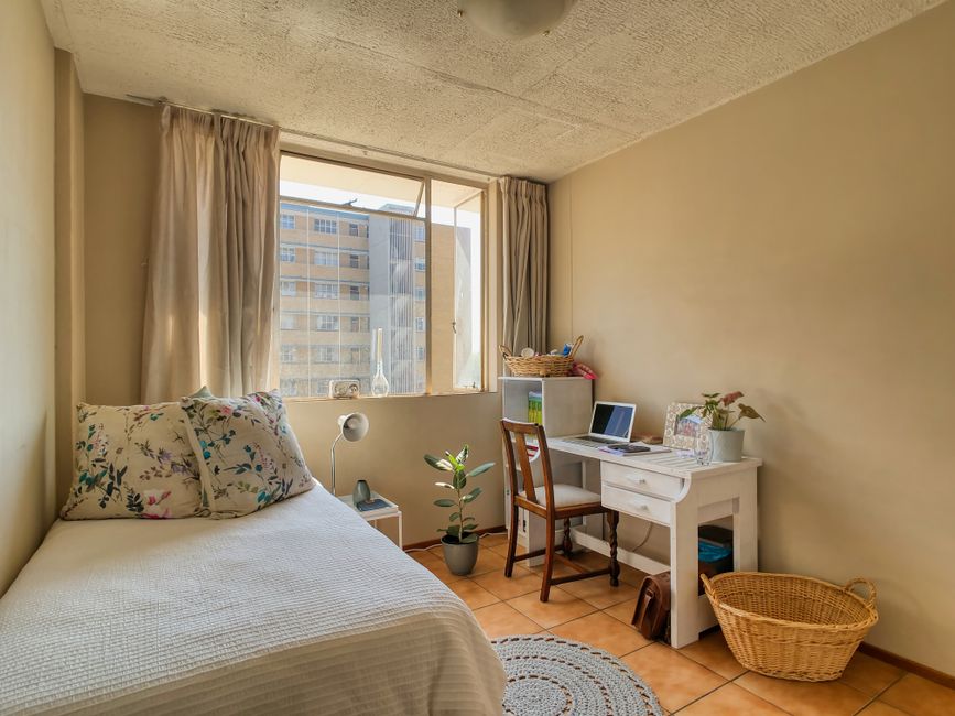 Bright student room with a desk